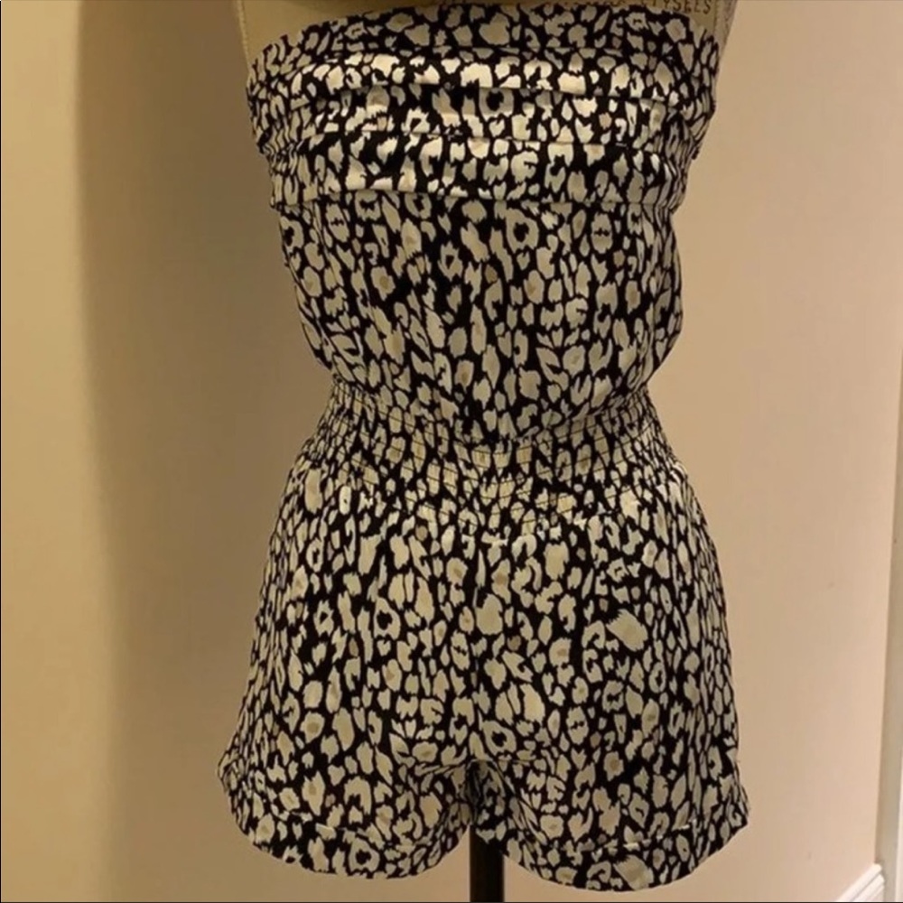 Bebe cheetah print romper